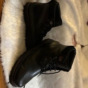 Black leather boots with Sherpa lining